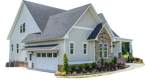 A house with a green background and white trim.