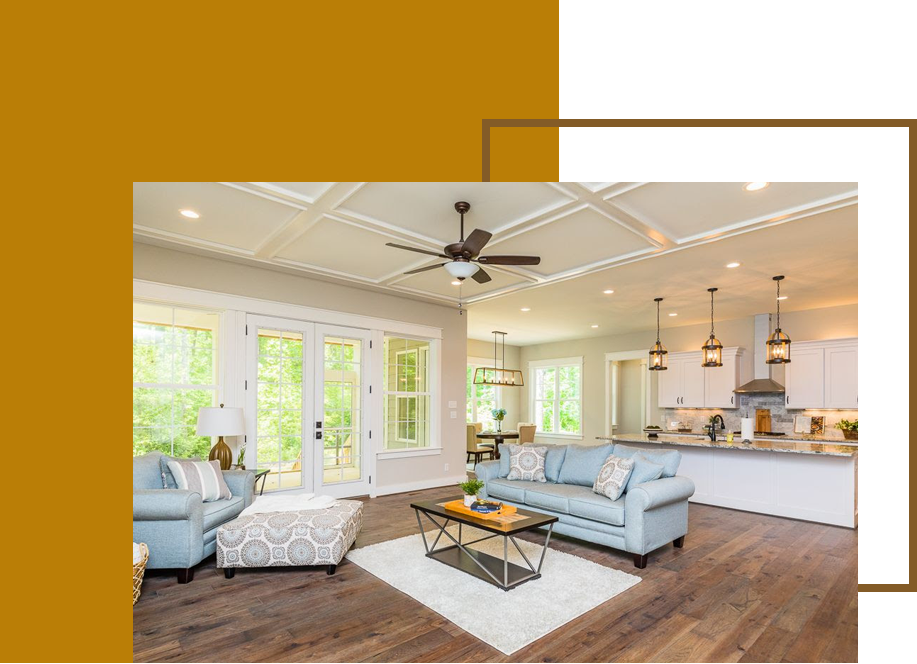 A living room with hard wood floors and furniture.